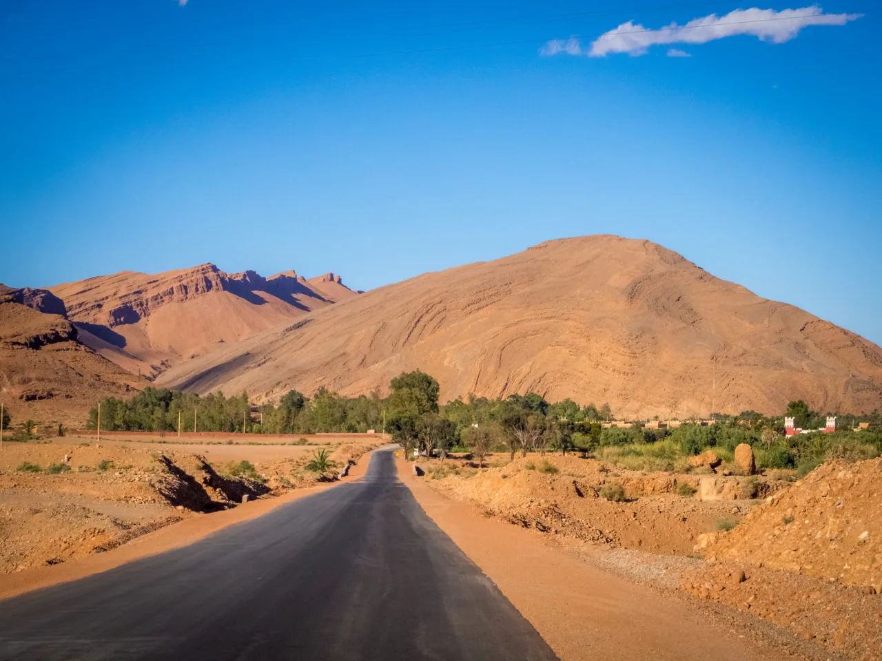 A road across an open landscape
